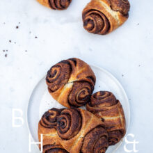 Food photography of cinnamon buns on white marble