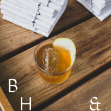 Culinary stories and food photography with a whiskey drink and linen napkins at Restaurant Criollo in Oaxaca