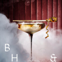 Honey Whisky cocktail photography in smoky pink bar