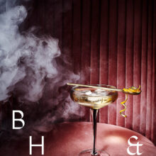 Honey Whisky cocktail photography in smoky pink bar - Anna Schneider drinks photographer