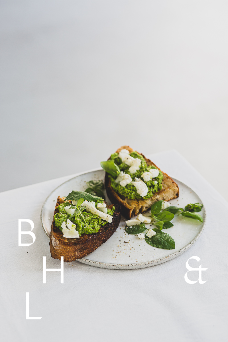 Roasted sourdough bread with pea spread and goat cheese